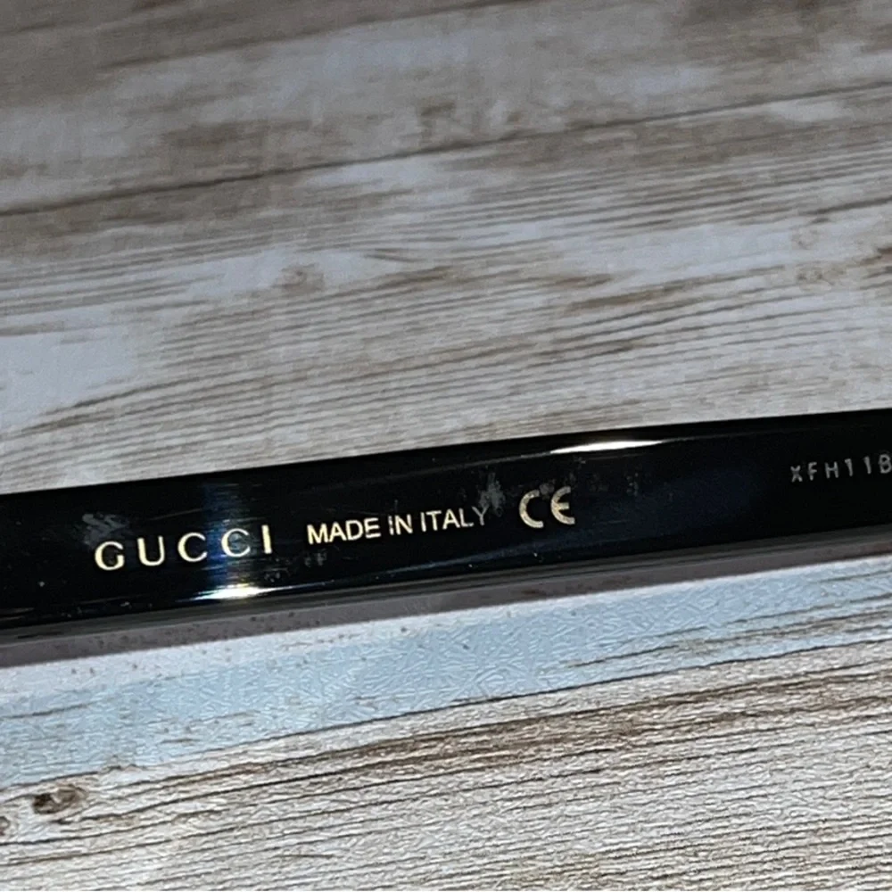Gucci GG0057SK Classic Black Sunglasses good condition